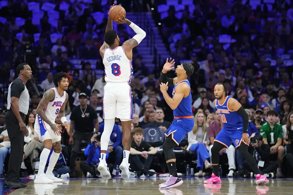 May 10, 2026; Philadelphia, Pennsylvania, USA; Philadelphia 76ers forward Paul George (8) shoots the ball against New York Knicks guard Josh Hart (3) in the first quarter during game four of the second round of the 2026 NBA Playoffs at Xfinity Mobile Arena. Mandatory Credit: Kyle Ross-Imagn Images