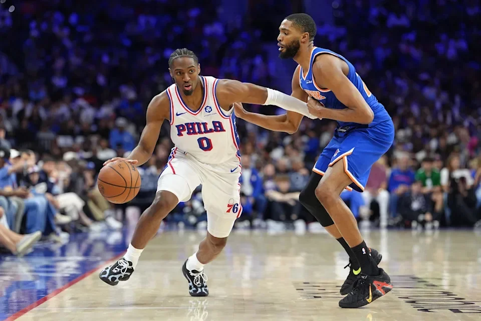 May 10, 2026; Philadelphia, Pennsylvania, USA; Philadelphia 76ers guard Tyrese Maxey (0) drives against New York Knicks guard Mikal Bridges (25) in the third quarter during game four of the second round of the 2026 NBA Playoffs at Xfinity Mobile Arena. Mandatory Credit: Kyle Ross-Imagn Images